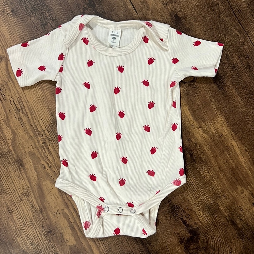Kate Quinn strawberry bodysuit